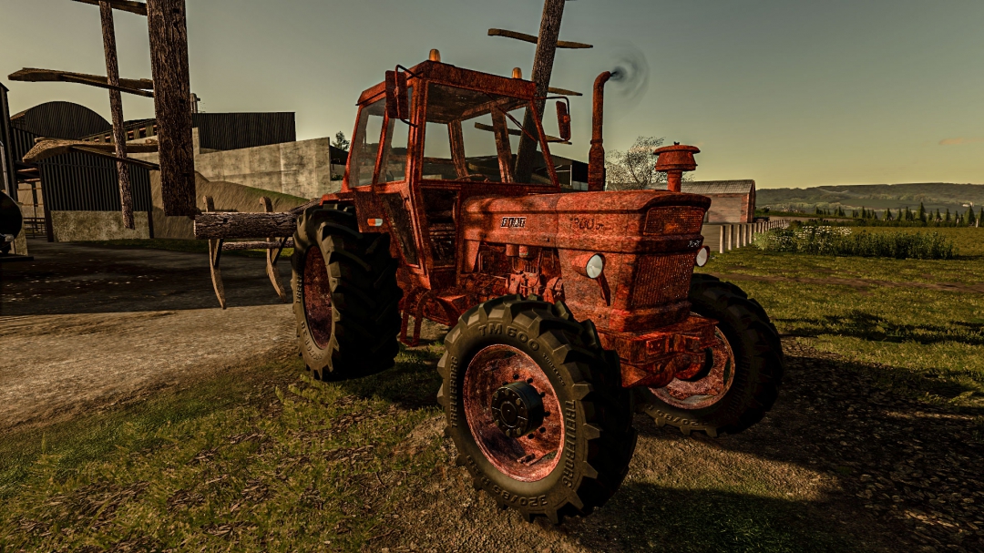 Rusty Tractor With Old Plow