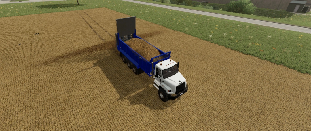 Freightliner 108SD with JBS 2248 Manure Spreader