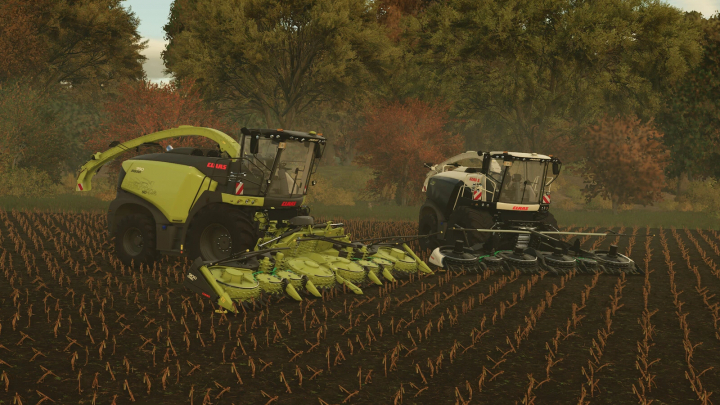 fs25-mods,  FS25 mod CLAAS JAGUAR 990-930 harvesting in a field with autumn trees.