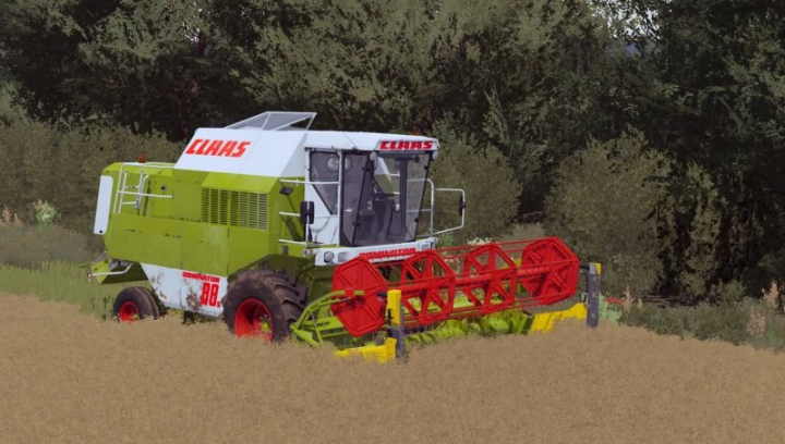 Claas Dominator 88s Mähdrescher in FS22-Mod, Farming Simulator 22. Klassisches Design, erntet auf einem Feld.