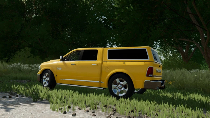 fs22-mods, Yellow Dodge Ram 2016 mod in FS22 driving through a forest scene