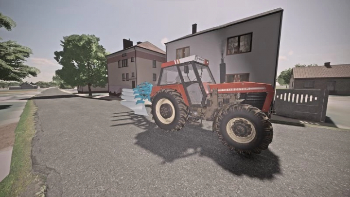 FS22 Overum 4 v1.0.0.0 mod met een rode tractor en ploeg in Farming Simulator 22.