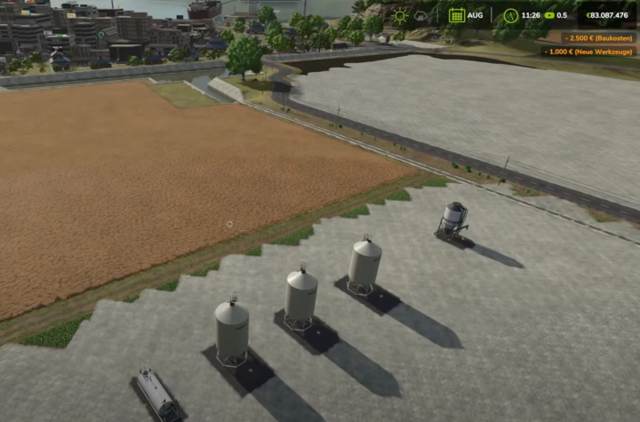 fs25-mods,  View of silos and fields in Fed Production Pack mod for FS25.