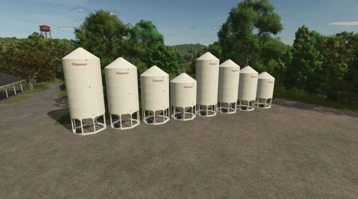 fs25-mods,  FS25-mod Foremost Smoothwall Hopper Bins v1.0.0.0 weergegeven in een rij op een boerderijlandschap.