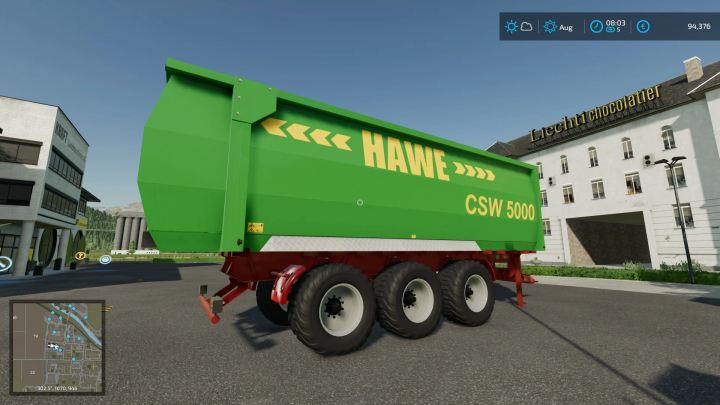 Mod FS22: rimorchio Hawe CSW 5000 parcheggiato in città in Farming Simulator 22.