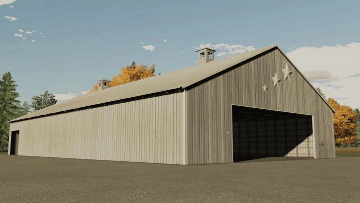 Old school American barn mod in FS22 with wooden design and star details.