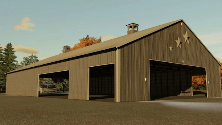 Old school American barn mod for FS22, featuring large double doors and star decorations, enhancing rustic gameplay aesthetics.