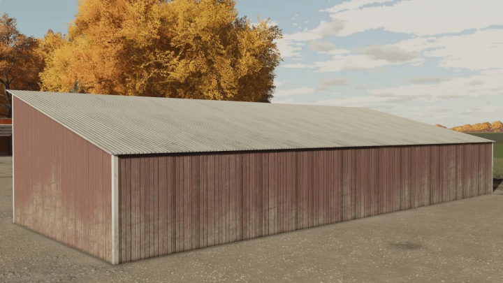 FS22 mod showcasing old school American barn with red wooden walls and a metal roof.