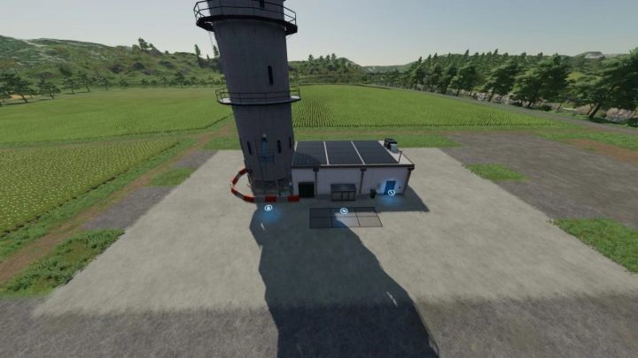 fs22-mods, Processing of Bales and Chaff mod in FS22, showing a building with solar panels and a large cylindrical structure on a farm.