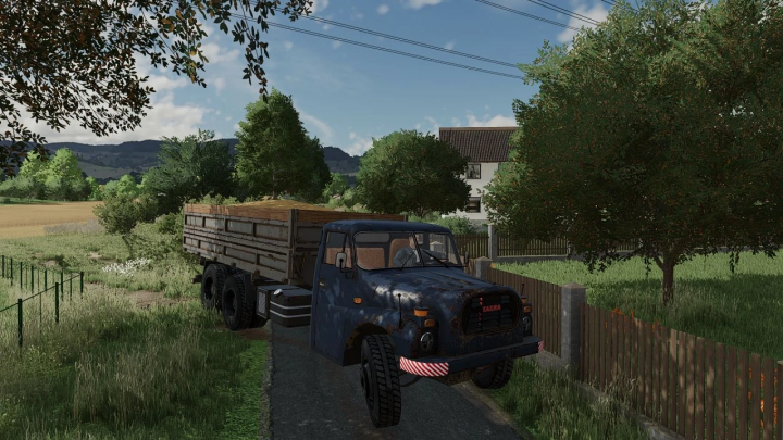 fs22-mods, Tatra 148 Agro truck parked on a rural road in Farming Simulator 22 mod.