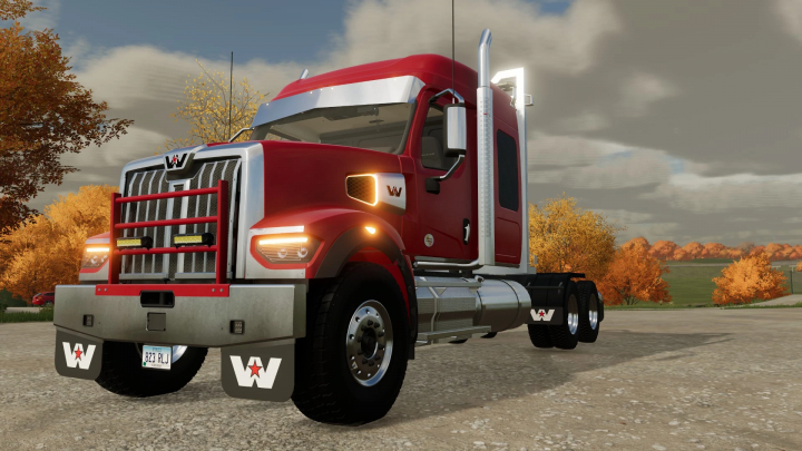 FS22 mod WesternStar 49X truck in red with chrome details, set in an autumn landscape.