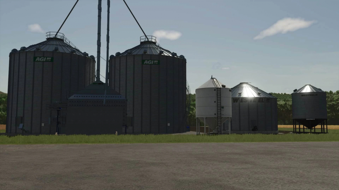 Screenshot of AGI Placeables mod in FS25 featuring silo installations against a clear sky.