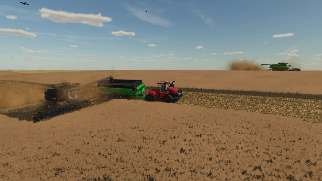 FS22 mod Abbey Saskatchewan: Combine harvesting wheat under blue sky.