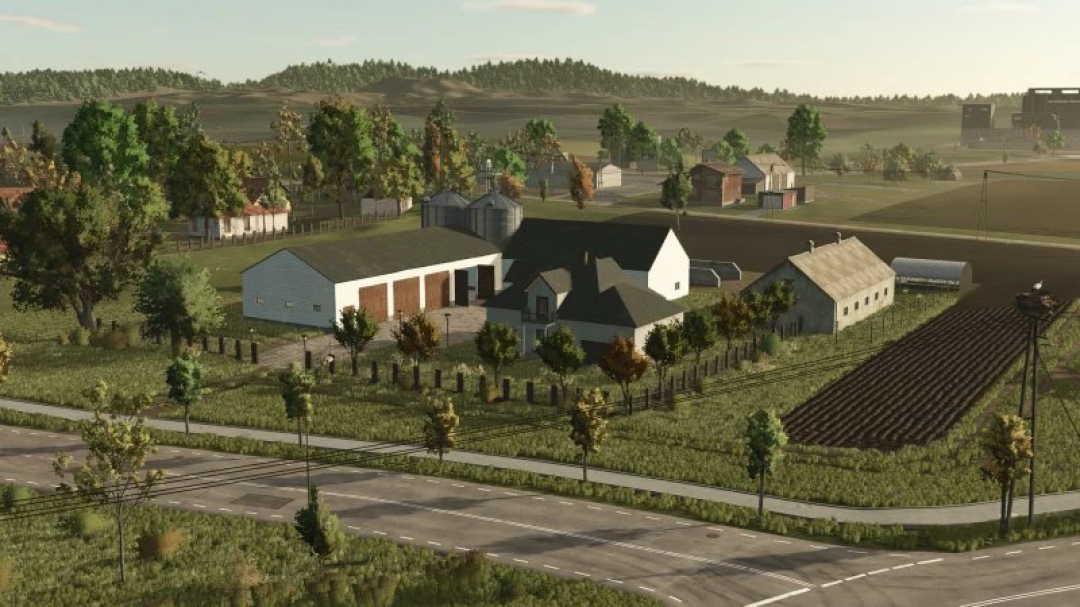 A scenic farm landscape in FS25 Save Zielonka mod showcasing buildings, fields, and tree-lined roads. FS25 mods enhance the farming simulation.