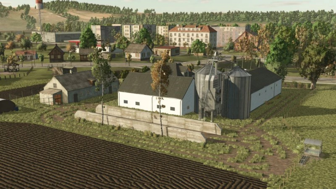 FS25 Save Zielonka mod v1.0.0.0 showing a detailed farm landscape with buildings and silos in Farming Simulator 25.