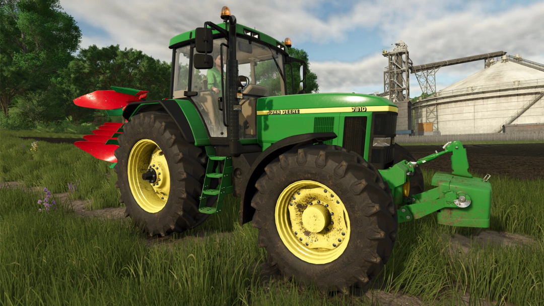 FS25-mod: John Deere 7810-tractor in veld, gedetailleerd model voor Farming Simulator 25.