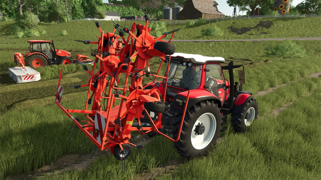 FS25 mod, Kuhn GF 8712 tedder on a red tractor in a grassy field, Farming Simulator 25.