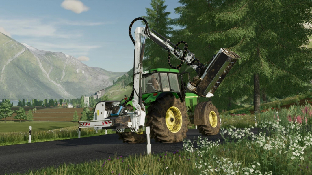 FS22 mod Lizard Energy v1.0.0.0 showcasing a tractor with an arm attachment on a scenic road.