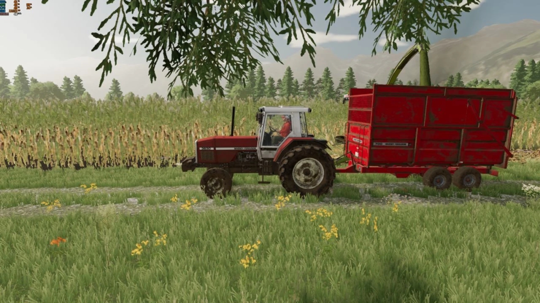 Mod del tractor Massey Ferguson 700 en FS22, remolcando un tráiler rojo en un campo verde.