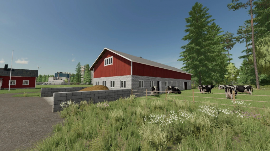 FS22 mod Old Brick Cow Barns with cows grazing in a fenced area, enhancing farming experience in Farming Simulator 22.