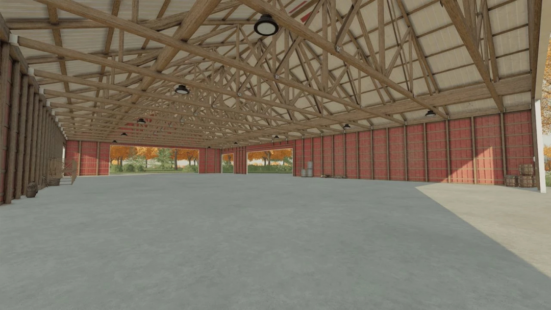 Intérieur de la grange américaine ancienne pour FS22, avec poutres en bois et espace ouvert.