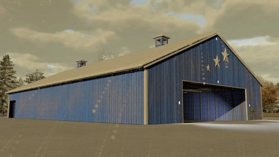 Mod de vieille grange américaine pour FS22, avec une façade bleue et des décorations en étoiles.