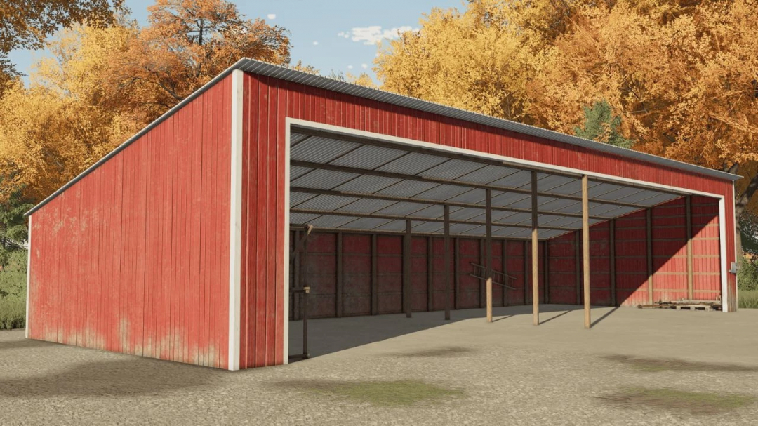 Mod FS22 : grange américaine d'époque avec structure en bois rouge et arbres d'automne en arrière-plan.