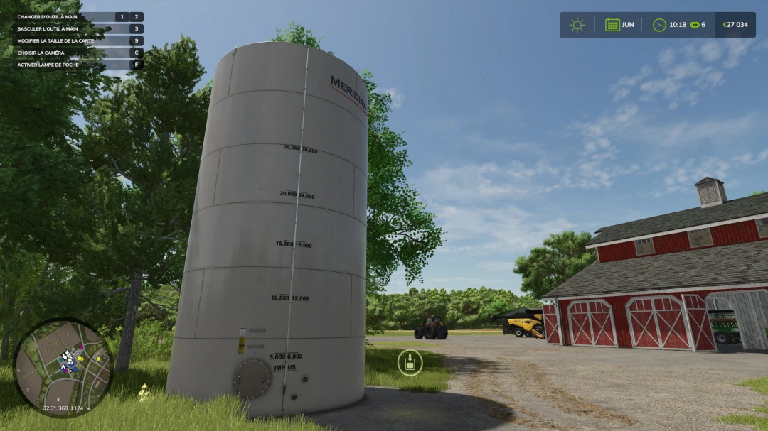 FS25 mods: Silo Multifruits v1.0.0.0 in a farm scene with a barn and tractor.