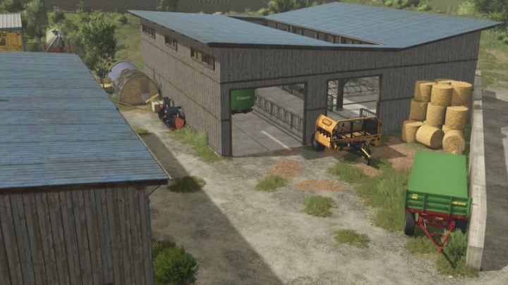 fs25-mods,  FS25 mods: Barn with pasture v1.0.0.0 in Farming Simulator 25, featuring a barn, hay bales, and agricultural equipment.