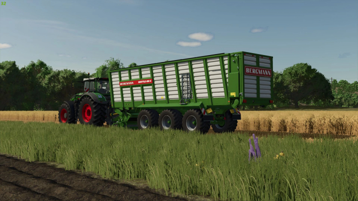 fs25-mods,  Bergmann Shuttle 490S mod in FS25, attached to a tractor on a field.