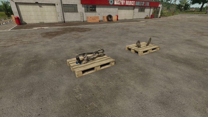 fs25-mods,  Chains and cables on wooden pallets in FS25 mod, Chains and Cables v1.0.0.0, outside a workshop.