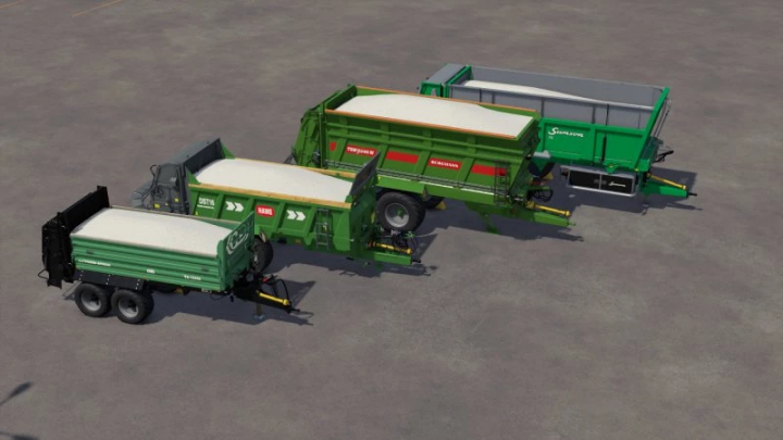 fs25-mods,  Cztery rozsiewacze wapna w modzie Farming Simulator 25, prezentujące różne modele w rzędzie. Mody FS25 wzbogacają grę o nowy sprzęt.