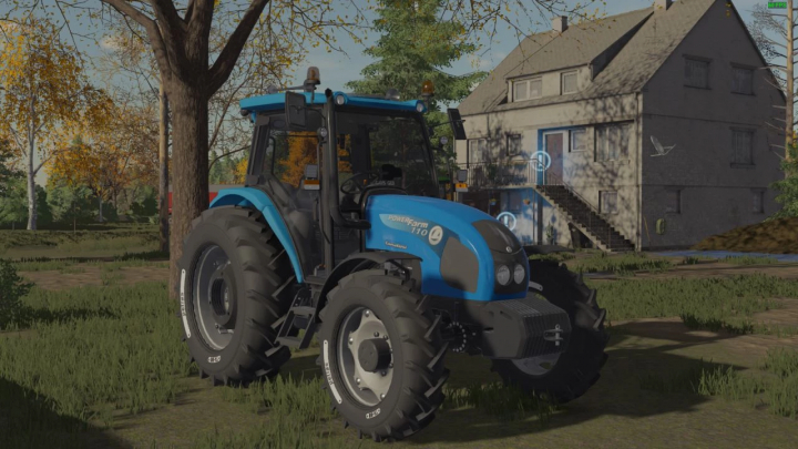 fs22-mods,  FS22 Landini PowerFarm tractor mod parked in a grassy area with trees and a house nearby.