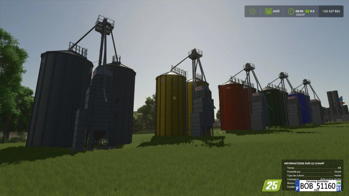 fs25-mods,  Colorful Mega Silo Multifruits mod in Farming Simulator 25 featuring various silos for crop storage in game.