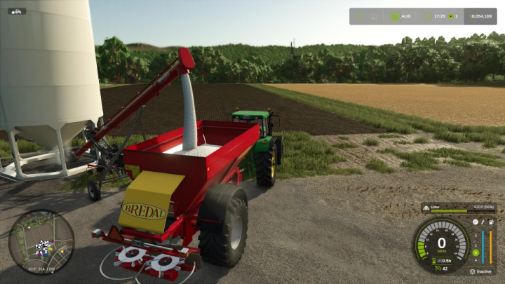 fs25-mods,  FS25 mod featuring Meridian TL 1239 v1.0.0.0 trailer attached to a tractor, next to a silo in a farming scene.