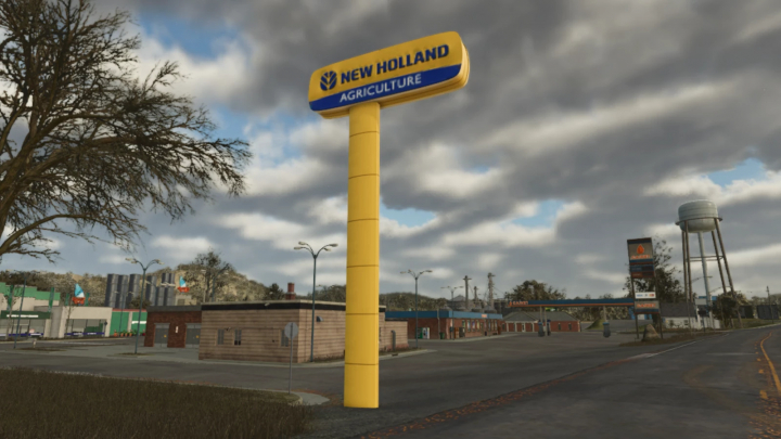 fs25-mods,  New Holland Dealer Signboard mod in FS25 showing a tall yellow sign in a rural setting.