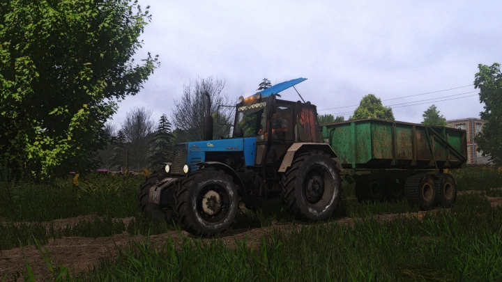 fs22-mods, FS22 mod image of PolGrom BTZ Zeus tractor with trailer in a lush field, showcasing Farming Simulator 22 mods.