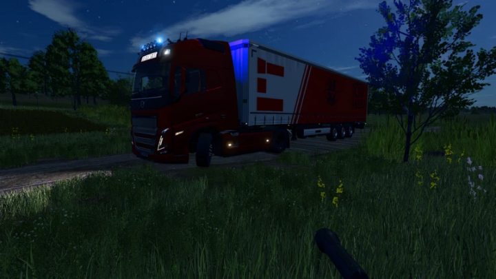 fs25-mods,  ProfiLiner brandweermod in FS25 toont een rode vrachtwagen met trailer 's nachts.