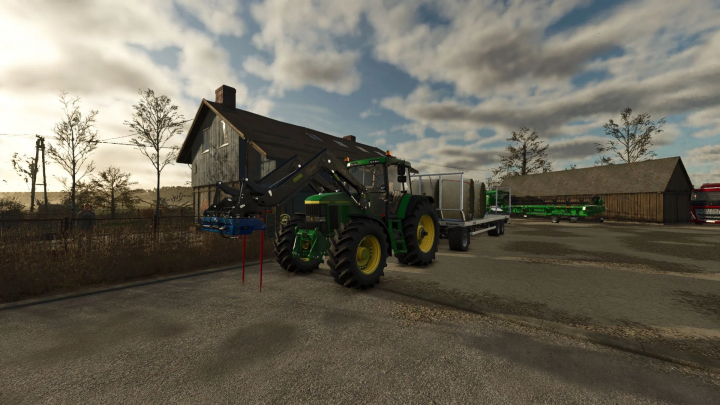 fs25-mods,  Farmyard scene in FS25 mod Reshade by AgrarAndy, featuring a tractor with a front loader beside a barn.