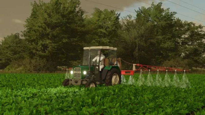 fs22-mods, FS22 mod Ursus C330 spraying crops in a lush green field.