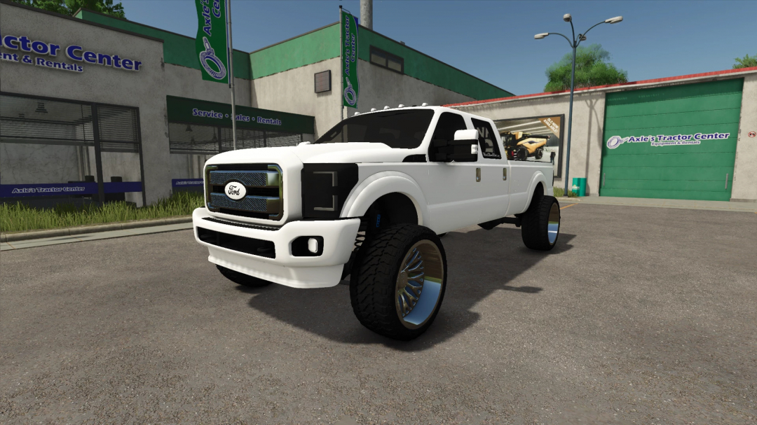 White 2016 Ford F350 mod in Farming Simulator 25 outside tractor center.