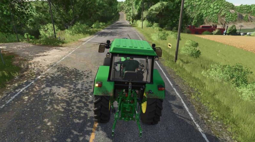 FS25 mod Auto Turn Signal Off v1.0.0.0, tractor verde en camino rural con vegetación exuberante