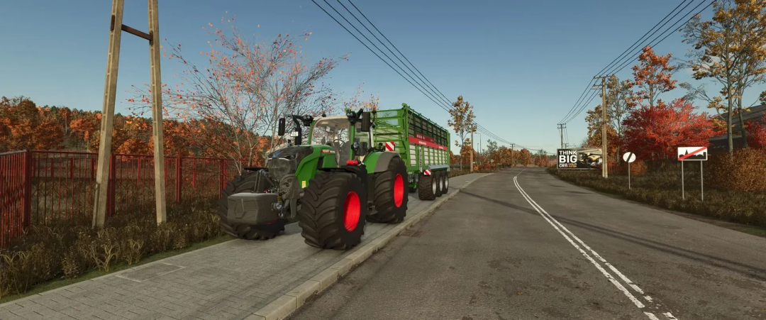 FS25 mod Bergmann HTW65 v1.0.1.0 shows a tractor on a rural road in autumn scenery.