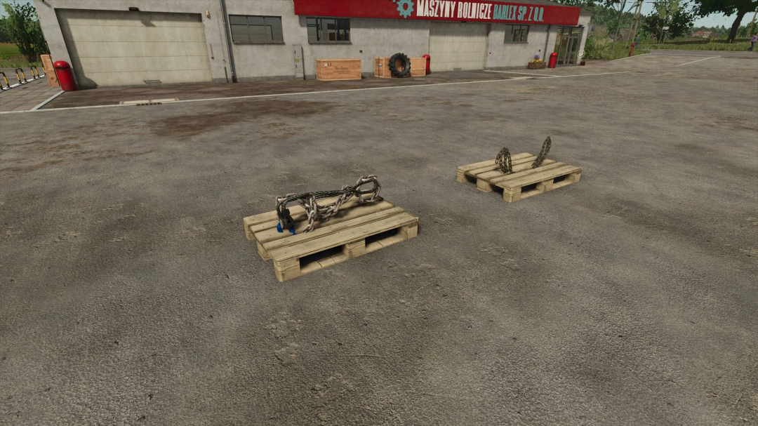 Chains and cables on wooden pallets in FS25 mod, Chains and Cables v1.0.0.0, outside a workshop.