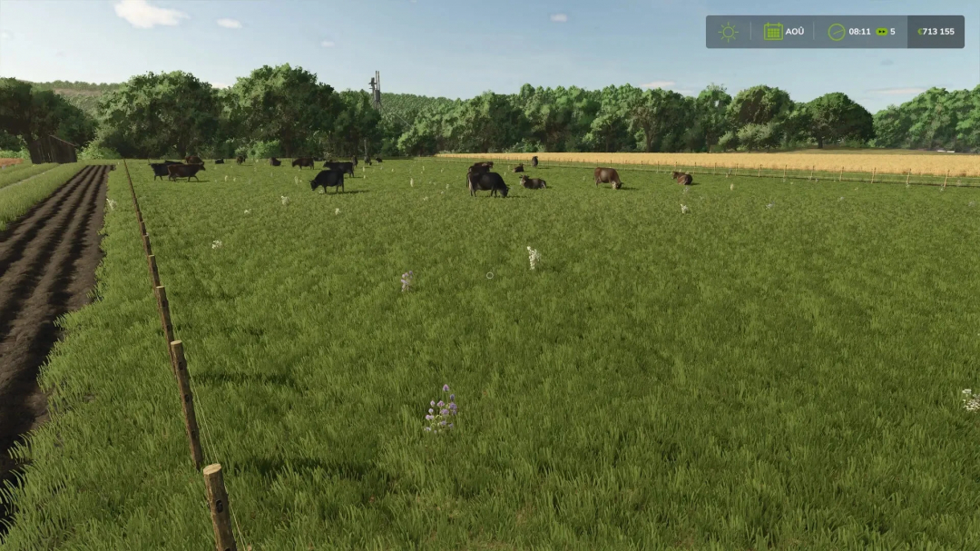 FS25 mod Cow pen v1.0.0.0 showing lush pasture with cows grazing in a fenced area.