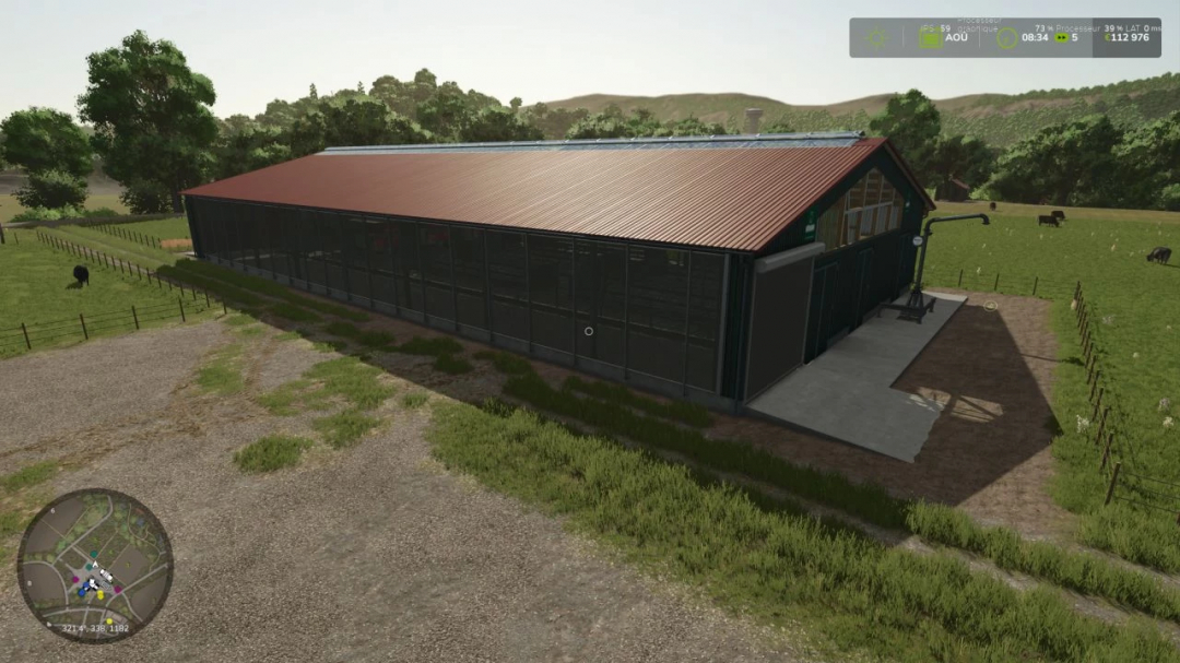 FS25 mod Cow Stall v1.0.0.0, featuring a large barn with a red roof in a farm setting.