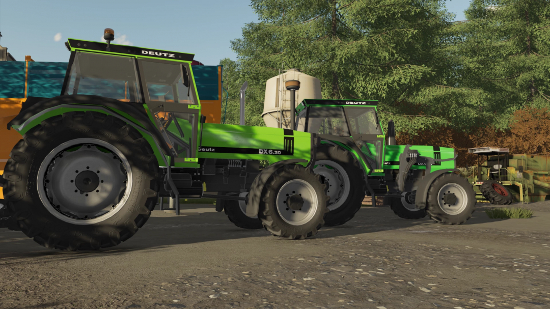 Deutz DX tractor mod in FS22, showing two bright green tractors on a farm setting.