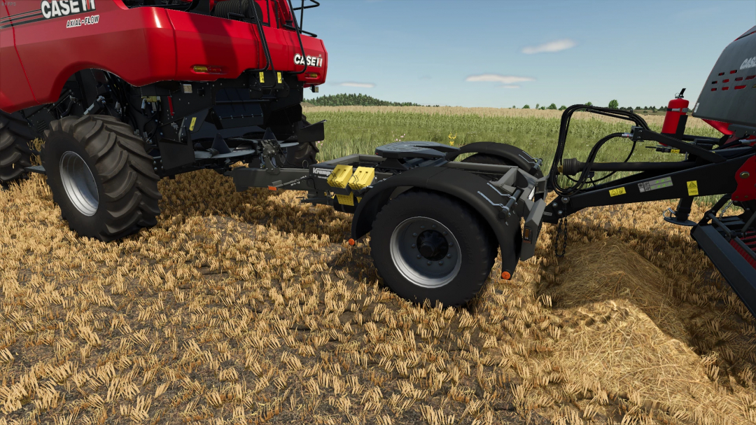 FS25 mod Dolly Extended v1.0.0.0 connects farm equipment on a harvester in a field, enhancing Farming Simulator 25 experience.