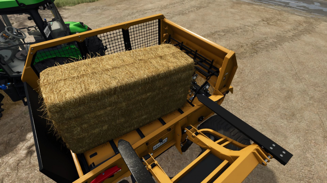 Elmer's Ravage straw blower mod v1.0.0.0 in Farming Simulator 25, with a straw bale loaded in the machine.