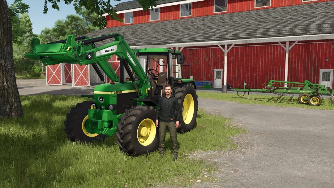 FS25 mod John Deere 3650 tractor with a loader in front of a red barn.